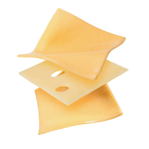 istock Three yellow cheese slices isolated on white background 1291576049