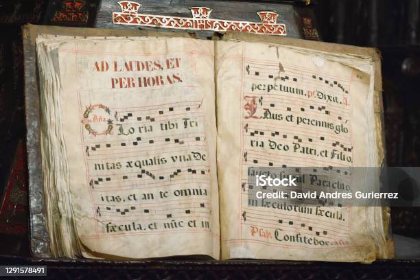 Ancient Codex Book Written In Latin With Musical Score Of Gregorian Singing Ad Laudes Et Per Horas At Astorga Cathedral Spain Stock Photo - Download Image Now
