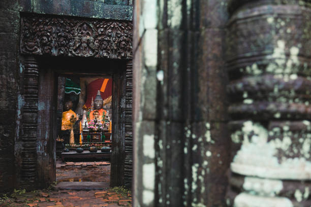 istock Buddha statue in a temple in Laos 1291580966
