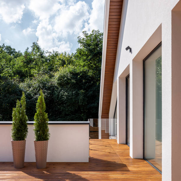 istock Attic balcony with decorative thuja plant 1291581368