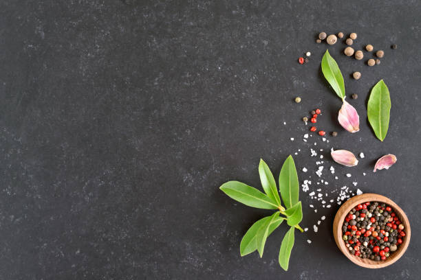 istock Fresh bay leaf, allspice, pink peppercorn, garlic 1291583152