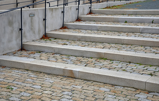 architecture, back, black, blind, blindness, brown, cement, cobblestone, concrete, construction, design, elevation, entrance, exterior, floor, footpath, garden, granite, gray, immobile, long, new, old, outdoor, overcome, park, pavement, people, railing, railings, ramp, rectangle, rectangular, smooth, staircase, steel, step, stone, street, stripes, surface, texture, tile, tiles, tread, urban, wall, wheelchair, wide, yard