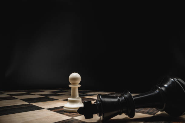 istock Macro shot of wooden chess figures on board 1291583920