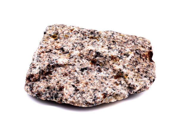 Granite stone isolated on white background Granite stone isolated on white background igneous rock stock pictures, royalty-free photos & images
