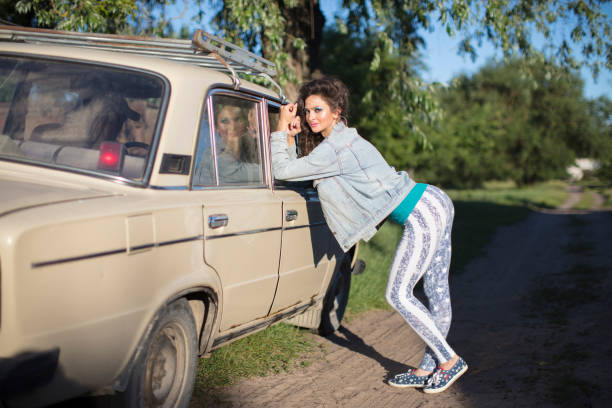 istock Funny young woman in a denim jacket 1291585710