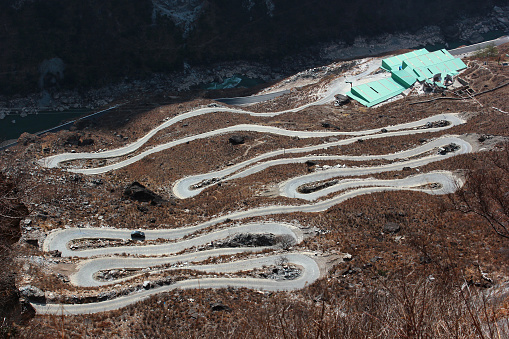 Mountain road in one of the deepest ravines of the world, Tiger Leaping Gorge in Yunnan, Southern China