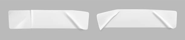 istock White glued crumpled rectangle stickers mock up set. Blank white adhesive paper or plastic sticker label with wrinkled and creased effect. Template label tags close up. 3d realistic vector 1291588155