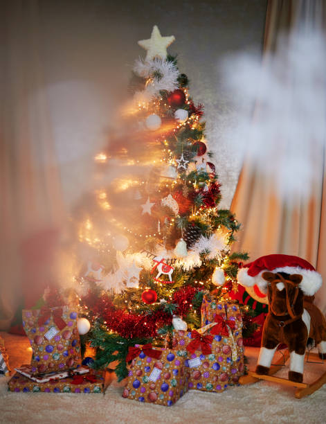 Upside Down Christmas Tree as a festive symbol of the Holy Trinity or new Holiday trend as an Upside-Down pine with decorative traditional ornaments to celebrate the Winter Holidays and New Year celebration.