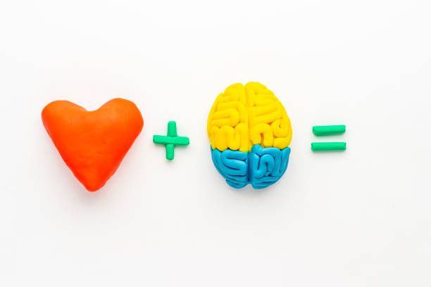 istock Heart and brain connection. Emotional intelligence concept. 1291589638