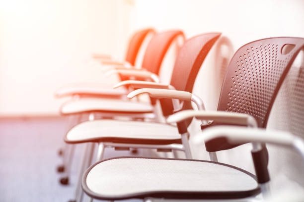 Close up table with equipment in conference room.