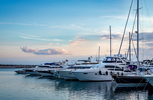 Marbella / Spain - December 21 2014: Sunset in Puerto Banus, a marina located in the area of Nueva Andalucía, to the southwest of Marbella, Spain on the Costa del Sol.
