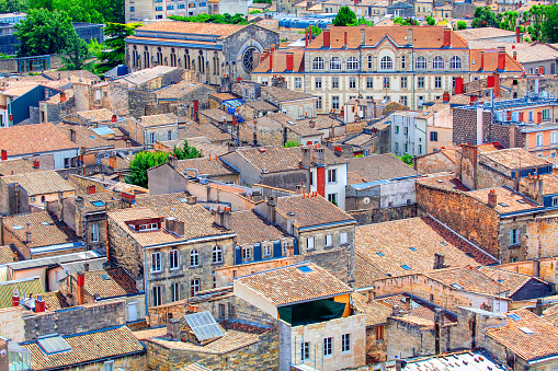 Medieval district in Bordeaux . Houses with tiled roof in old town
