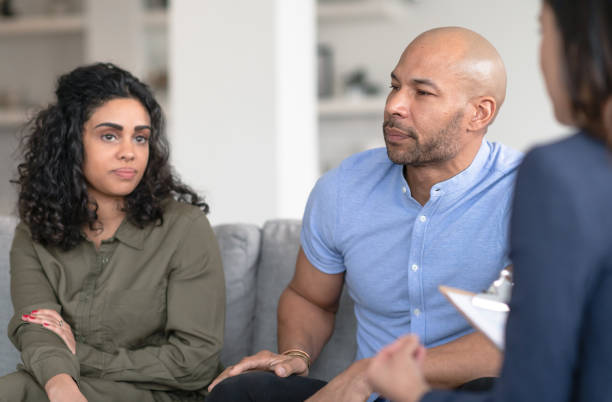 istock Interracial couple at marriage counselling session 1291600040