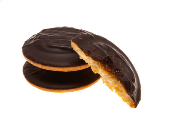 istock chocolate biscuit cookies with orange jam isolated 1291604584
