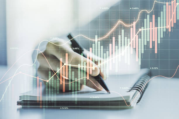 istock Double exposure of abstract creative financial chart with hand writing in notebook on background, research and strategy concept 1291606226