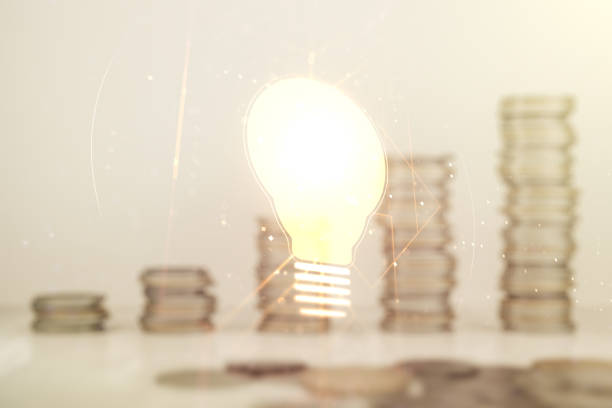 istock Virtual Idea concept with light bulb illustration on stacks of coins background. Multiexposure 1291606298