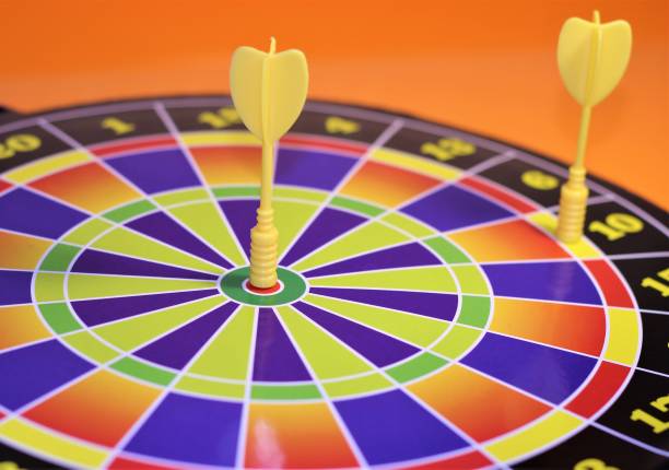 istock Board dartboard with two Darts at the target 1291606441