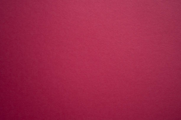 istock Magenta color wall texture background. Pink wall texture backdrop design. Purple or red backdrop and copy space 1291607355
