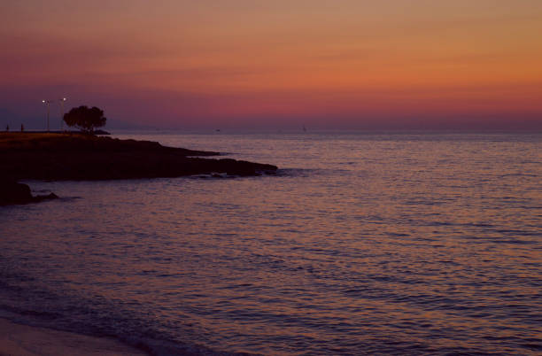 Sunset over Kato Gouves beach in Crete the largest and most populated of the Greek islands