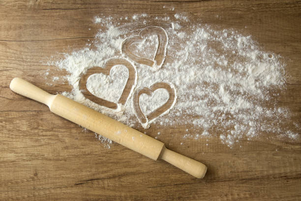istock How to make dumplings at home. Flour and rolling pin on the table. A dish for Valentine's Day. DIY. Step by step. Step 2 1291609169