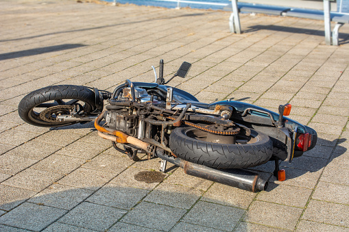 Motorcycle on its side