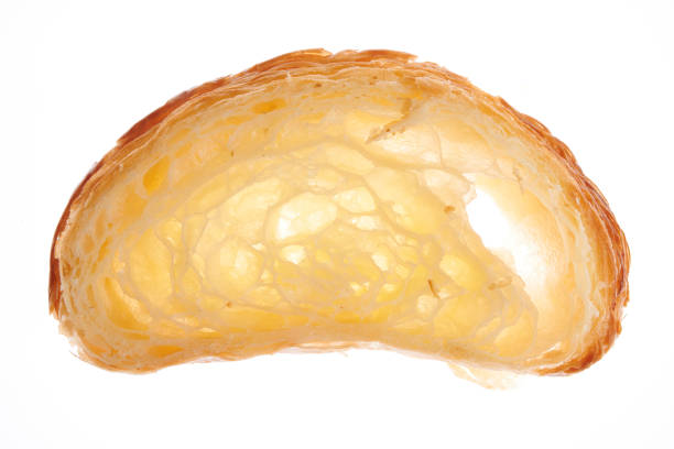 Growing French croissant on a white background lurie stock pictures, royalty-free photos & images