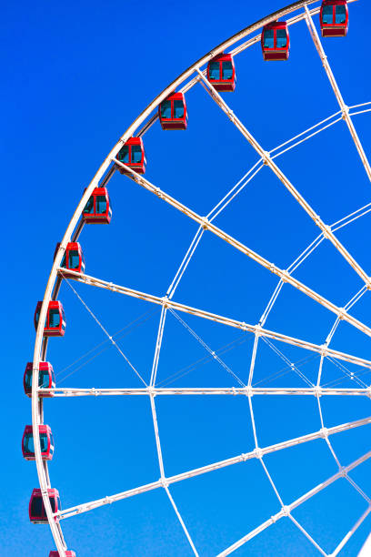 istock Ferris wheel against the blue sky close up 1291611685