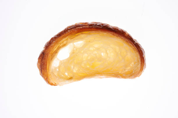 Growing French croissant on a white background lurie stock pictures, royalty-free photos & images