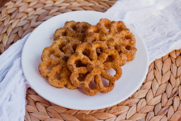 Mexican buñuelos de viento are a traditional fritter usually eaten for Christmas special firtter eaten for Christmas in Mexico fritter photos stock pictures, royalty-free photos & images