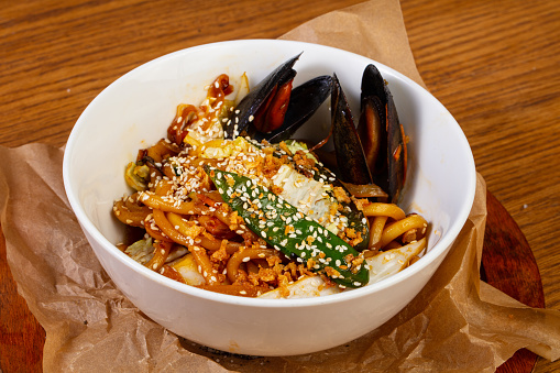 Pasta with seafood and sesam seeds