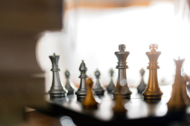 istock business strategy metaphor chess board game with abstract blur background 1291619043