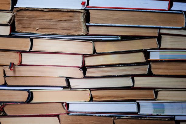 istock stack of old book, education concept background, many books piles with copy space for text 1291619182