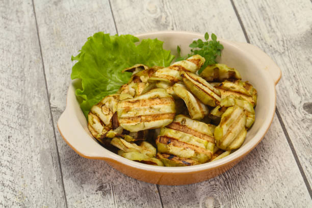 istock Grilled eggplant slices served basil 1291621412