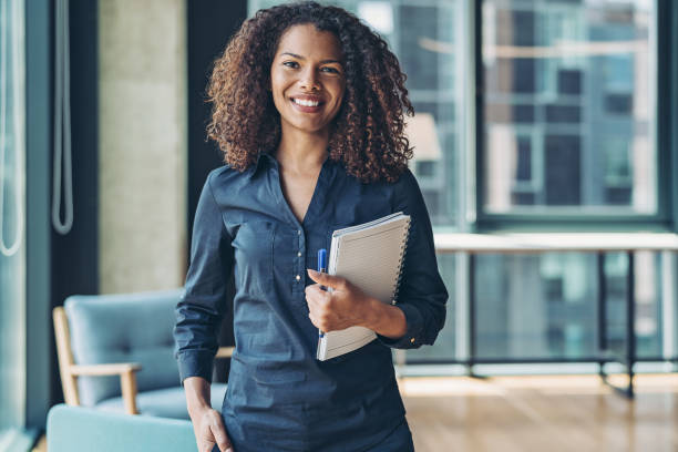 istock Young businesswoman in a modern office 1291622776