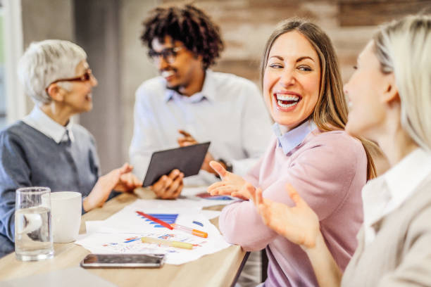 istock Modern business. Colleagues having a coffee break. 1291625702