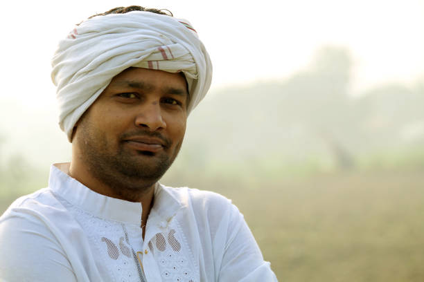 istock Indian farmer in turban 1291626749