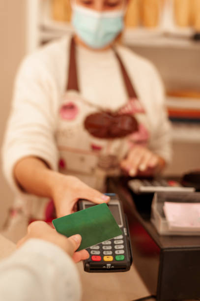 istock Paying with credit card. New normal concept. 1291626831