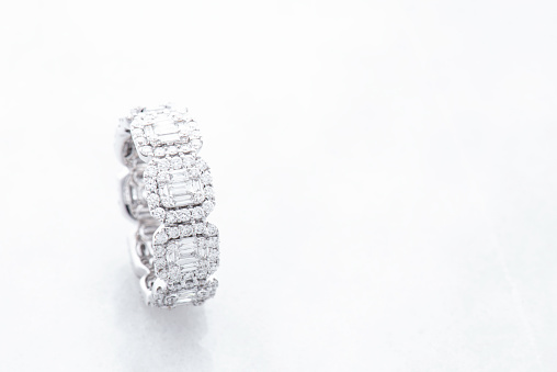 One diamond ring on white background. With selection on white background.