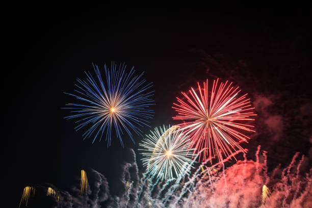 istock Fireworks light up the sky with smoke. Colorful. 1291628390