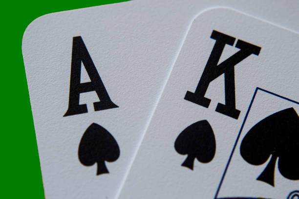istock Poker playing cards, Ace and king suited, close up 1291636353