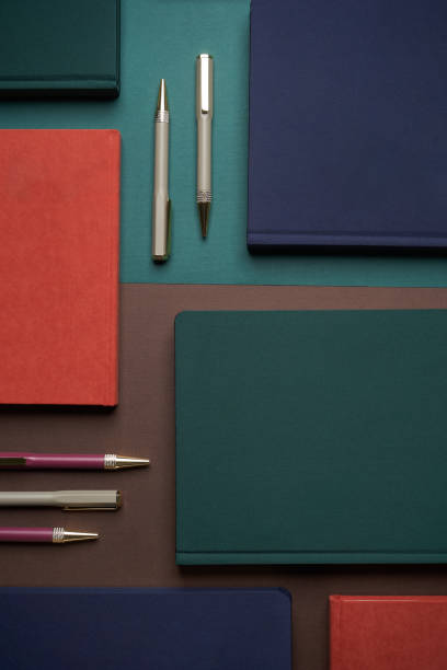 istock Education concept with books stacked on color background 1291636417