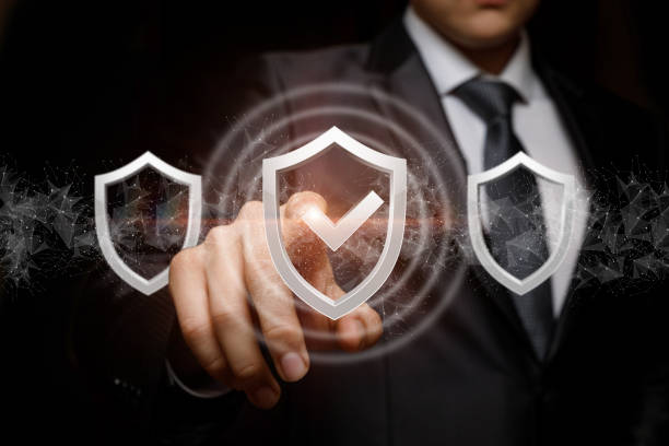 istock Businessman exposes the selected system protection . 1291636991
