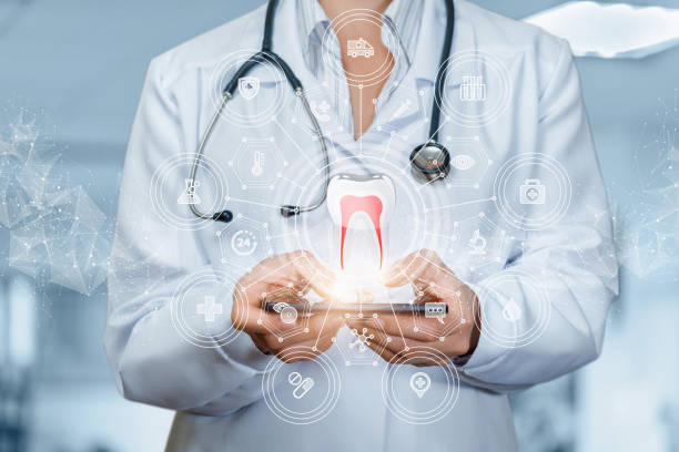 istock Doctor dentist working on the phone . 1291637004
