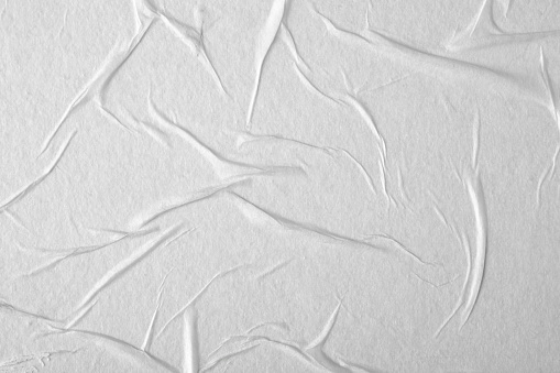 Papel blanco con pliegues. Textura de papel. photo