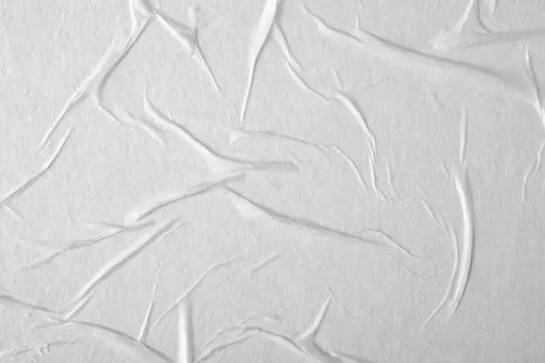 Photo of White paper with folds. Paper texture.