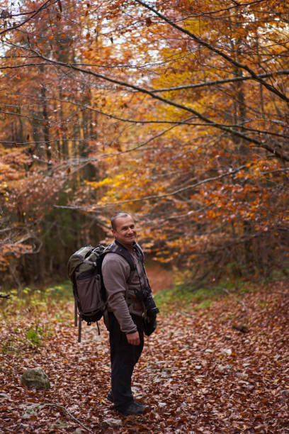 istock Hiking into the foggy forest 1291639801