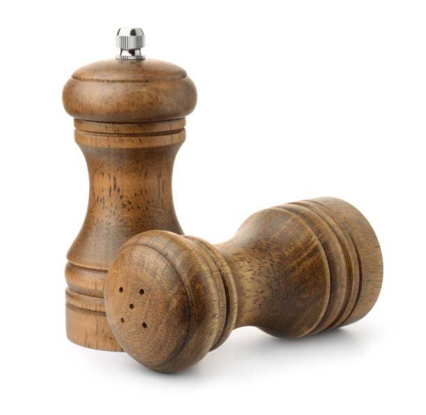 istock Wooden salt shaker and pepper mill 1291639857