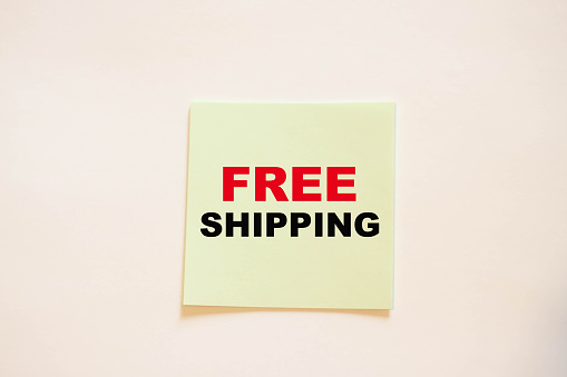 FREE SHIPPING on paper with a white background.