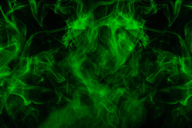 istock Green steam on a black background. 1291640923