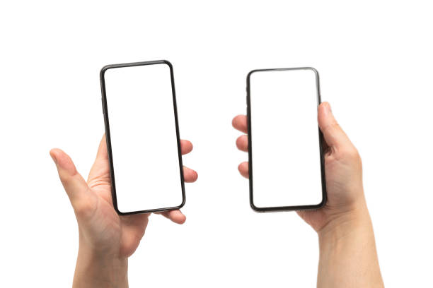 istock Smart phone in man hand isolated on white background.  White screen. 1291640948